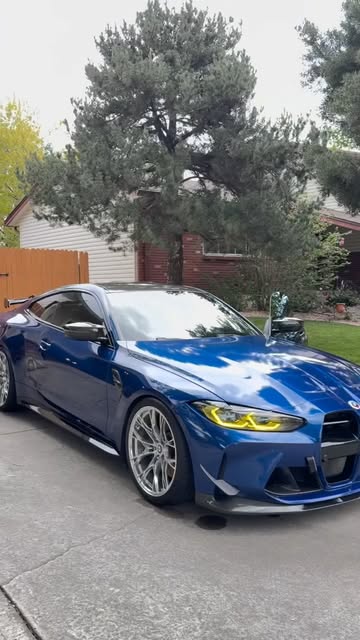 Blue BMW showcased outside after detailing